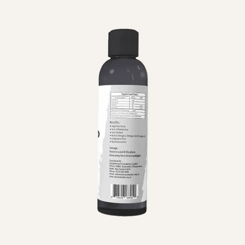 Applying black seed oil to scalp and ends – hair nourishment nz